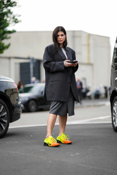 Skip the pumps and pull on a fresh pair of sneakers for work the next time you head into the office. From white sneakers to colorful sneakers trending for spring, we've got the best sneakers that'll meet your office dress code *and* comfort requirements.