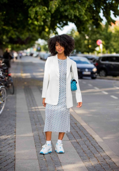 Skip the pumps and pull on a fresh pair of sneakers for work the next time you head into the office. From white sneakers to colorful sneakers trending for spring, we've got the best sneakers that'll meet your office dress code *and* comfort requirements.