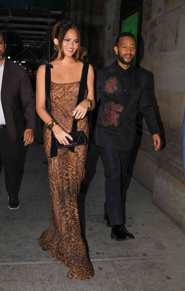 Although Chrissy Teigen skipped the 2024 Met Gala, she made sure to indulge in the "Garden of Time" dress code the next day at the ACE Awards. She wowed in a naked dress adorned with strategically placed floral details.