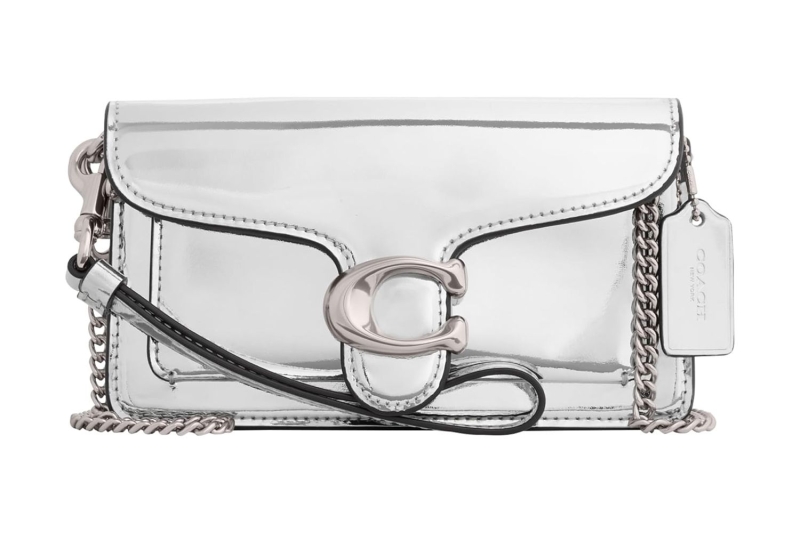 Dua Lipa carried a Jennifer Lopez-inspired silver metallic Gucci Horsebit Chain Shoulder Bag in New York City. Shop similar glitzy purses at Amazon, starting at $19.