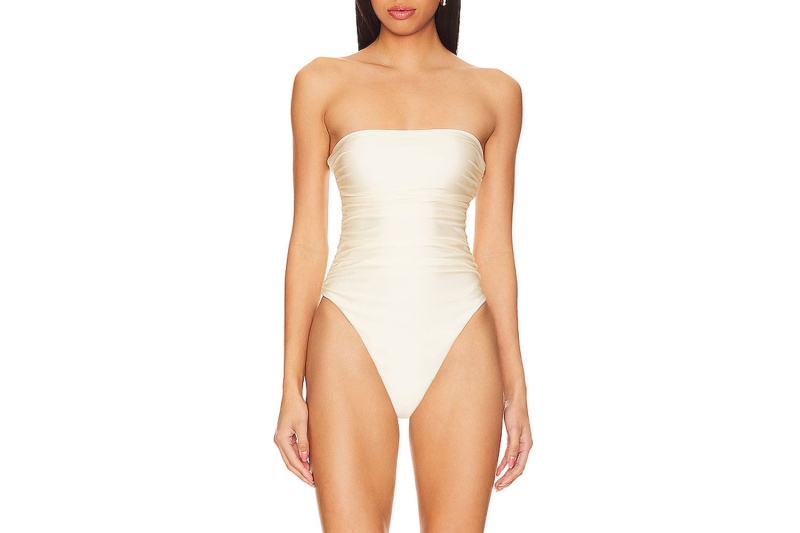 Kendall Jenner wore a strapless Saint Laurent cut-out one-piece swimsuit for the Fwrd Summer 2024 campaign. Shop cut-out and fully covered one-piece swimsuits on Amazon, Nordstrom, and J.Crew, starting at $29.