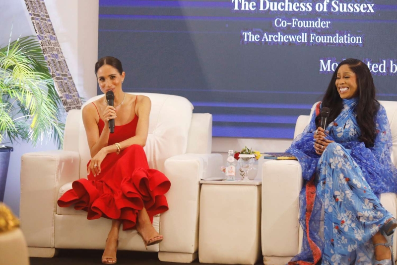 Meghan Markle wore a bright red midi dress from Orire to co-host the Women in Leadership Panel in Nigeria on May 11.