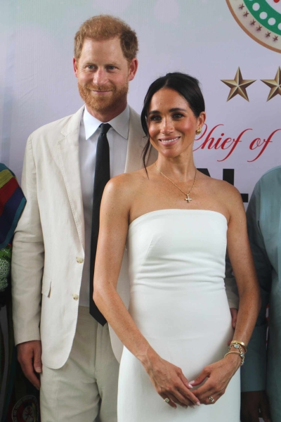 Meghan Markle wore a diamond cross necklace that once belonged to Princess Diana during her Nigerian tour on May 11.