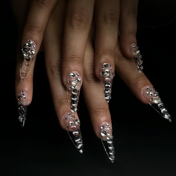 The glass nails trend is a manicure made with crystal-clear tips that look like glass. Here, explore 20 different ways you can rock the glass nails trend, with expert tips on recreating them at home.