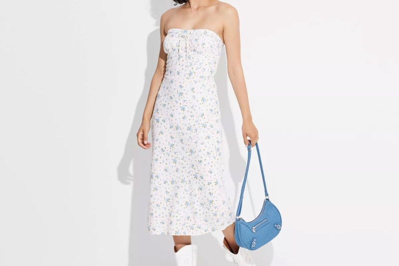 The Wild Fable Linen Tube Corset Bodycon Dress, $32 at Target, is one shopping writer’s favorite summer styles for hot weather. The fully lined midi dress is flattering on various bust sizes and features detachable straps for customized support.