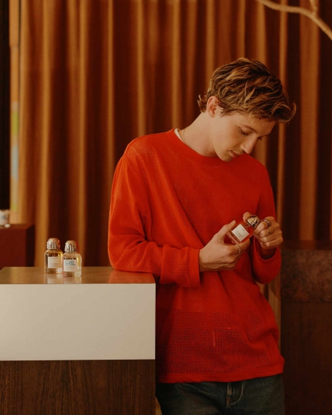 Troye Sivan's fragrance brand Tsu Lange Yor had its first pop-up in the U.S. While there, he spoke with InStyle about his fragrance routines, the brand's history, and gave us the reason by some of the NSFW bottles.