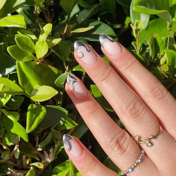 White and silver nails are trending everywhere, from street style to social media. Here, scroll through 20 white and silver manicures for inspiration.