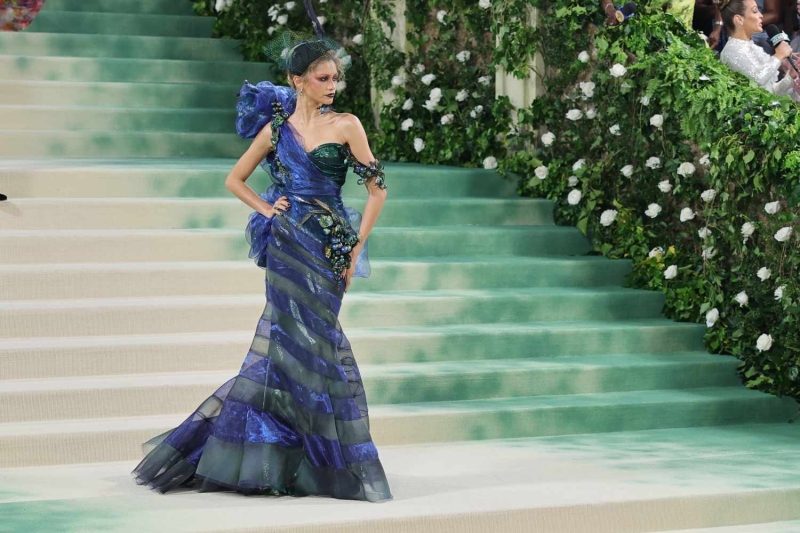 Zendaya secretly changed into a third look during the 2024 Met Gala that was fit for a bride. See the plunging white dress, here.