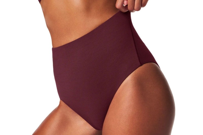 A fashion editor tried the flattering Spanx Pique One-Piece Shaping Swimsuit and received tons of compliments. Shop the ageless, smoothing swimsuit at Spanx.