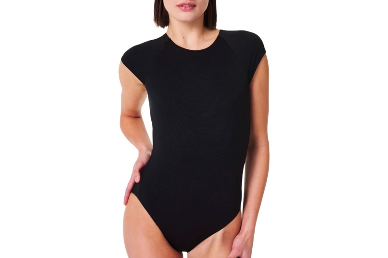 A fashion editor tried the flattering Spanx Pique One-Piece Shaping Swimsuit and received tons of compliments. Shop the ageless, smoothing swimsuit at Spanx.
