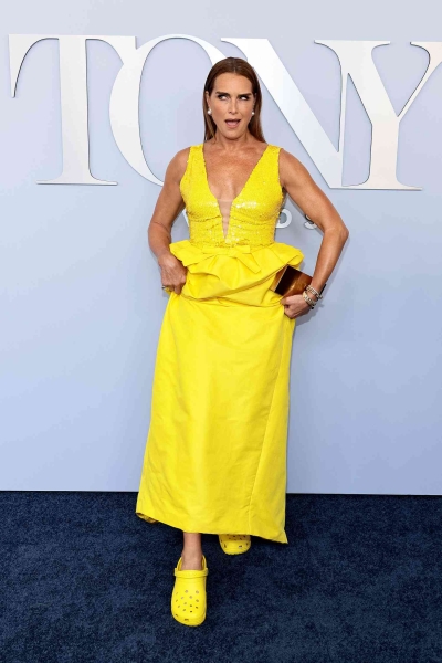 Brooke Shields ditched the heels for a pair of bright yellow Crocs at the 2024 Tony Awards on Sunday. See her full look here.