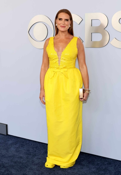 Brooke Shields ditched the heels for a pair of bright yellow Crocs at the 2024 Tony Awards on Sunday. See her full look here.