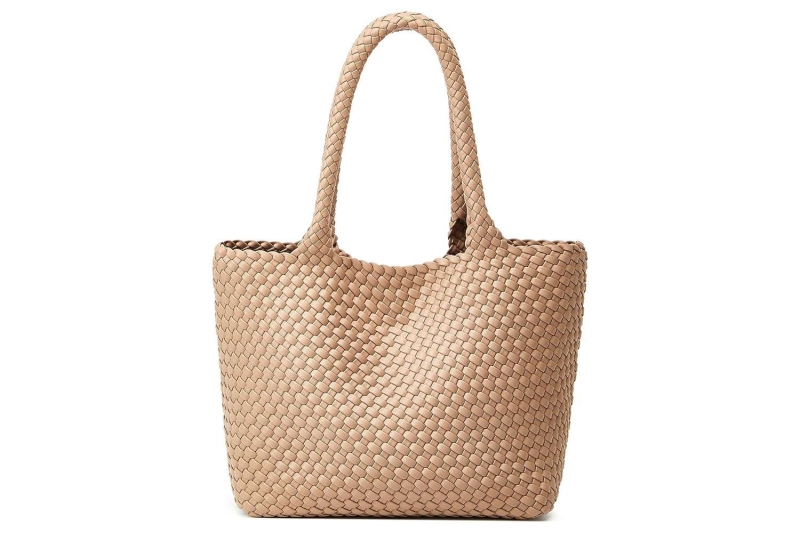 Jennifer Lawrence keeps carrying Naghedi’s St. Barths Large Tote Bag. Shop her exact style as well as more affordable woven tote bags from Amazon, Nordstrom, and more, starting at $20.