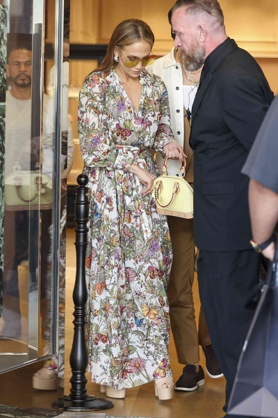 Jennifer Lopez was spotted grabbing lunch and doing some retail therapy in a colorful floral maxidress. See the bright and bold summer fashion look here.