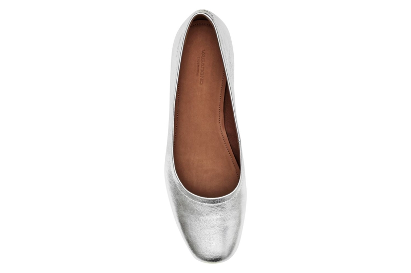 Katie Holmes wore Tory Burch silver ballet flats. Shop seven similar metallic flats and Mary Janes from Amazon, Nordstrom, Zappos, and more, starting at $28.