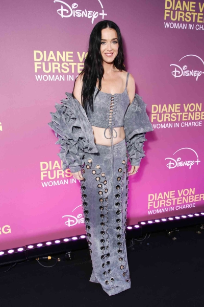 Katy Perry wore an all-denim outfit from Artemisi in Paris. See the full look, including her corset top and grommet-covered skirt, here.