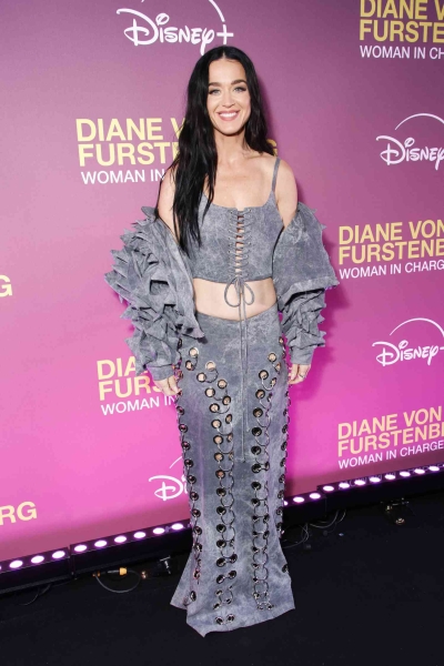 Katy Perry wore an all-denim outfit from Artemisi in Paris. See the full look, including her corset top and grommet-covered skirt, here.