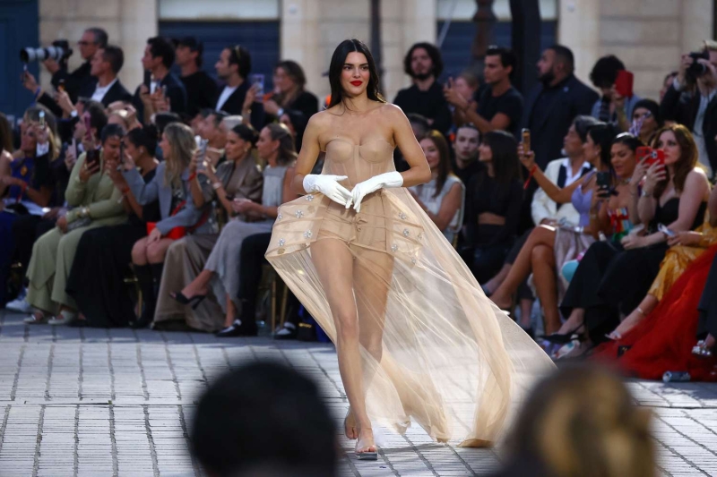 Kendall Jenner wore a nude and sheer hoop skirt dress to Vogue World: Paris 2024 that belonged in Netflix's 'Bridgerton.'