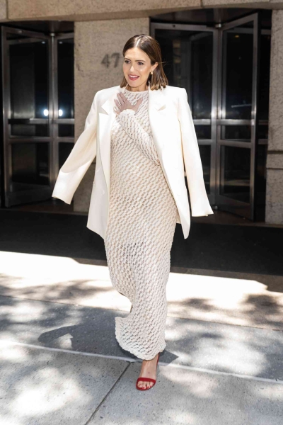 Mandy Moore wore a sheer knit dress that showed off her baby bump for her June 25 appearance on 'The View.' See her outfit here.