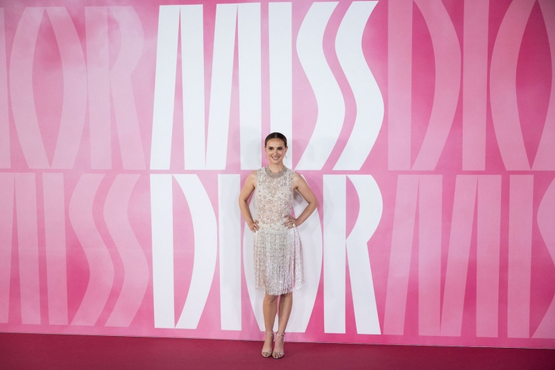 Natalie Portman attended the opening of a Miss Dior exhibit in Tokyo wearing a fringed, flapper-style dress. See the full look, here.