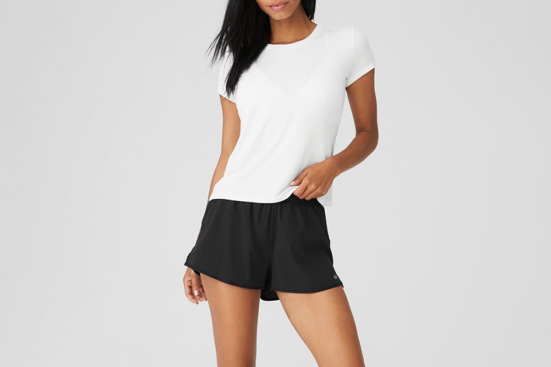 Plain white tees are a classic, versatile option that can be worn on its own, paired with jeans, skirts, underneath a good blazer, or even with sweatpants—the options are truly endless.