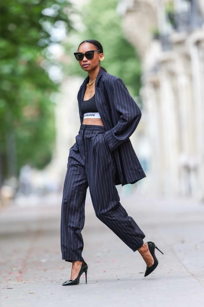 Suits never go out of style and can be worn year-round. Here are suit outfit ideas for every occasion and tips on how to style them, even during summer.