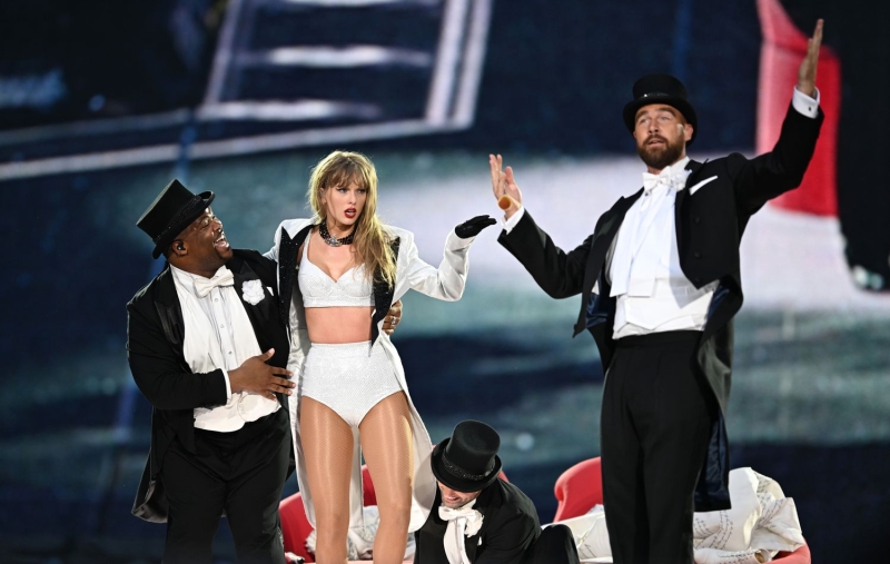 Taylor Swift and Travis Kelce were spotted in coordinating couple looks while partying in London after his surprise cameo during night three of the 'Eras Tour' shows at Wembley Stadium.