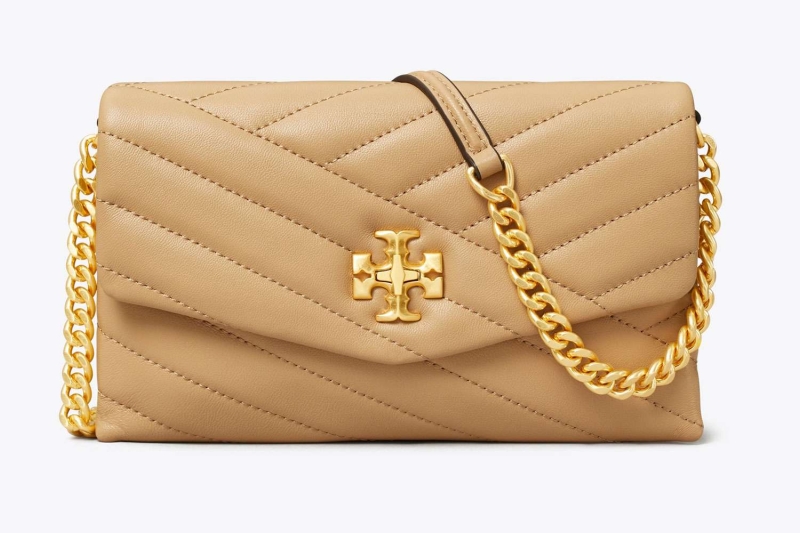 Tory Burch is offering up to 62 percent off over hundreds of items, including summer-ready bags, sandals, sneakers, wallets, and accessories. A fashion editor's top 10 picks start at $45.