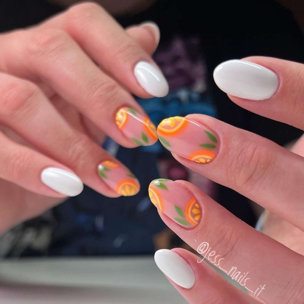 White nail polish is one of the most requested shades of summer, but it's a shade that can truly be worn year-round. Here, find over a dozen crisp short white nail looks to brighten up your manicure.