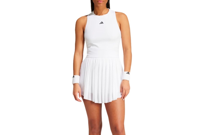 Adidas’ Tennis Pro Aeroready Dress features a pleated skirt and separate shorts to wear underneath. The athletic dress is one writer’s go-to for hot summers.