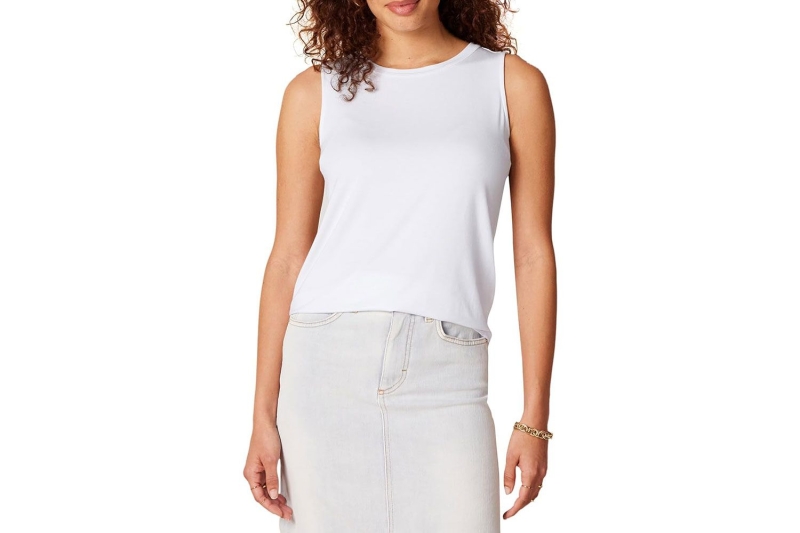 Blake Lively and Kendall Jenner have been wearing flattering white tank tops nonstop, so much so that I’m officially deeming it summer 2024’s hero basic. Shop easy going white tank tops to wear nonstop this season from Good American, Reformation, Madewell, and more.