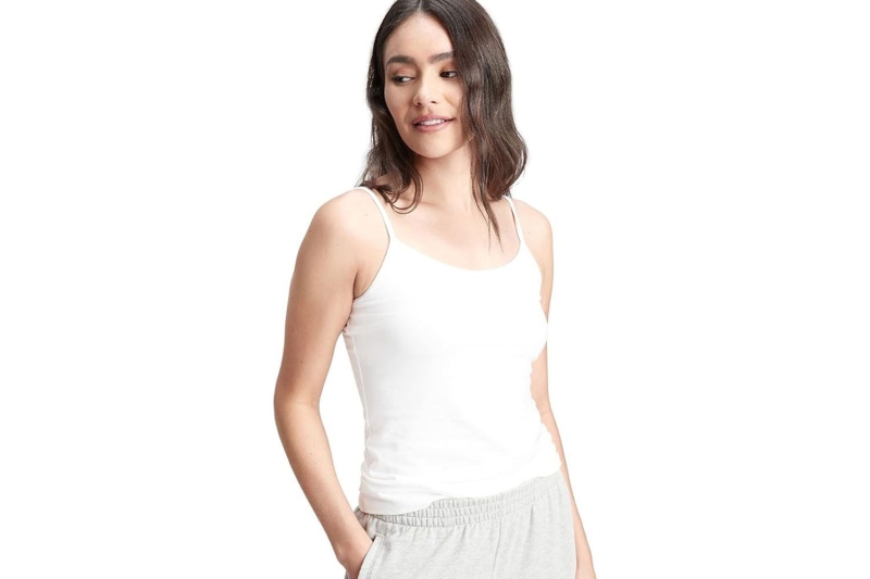 Blake Lively and Kendall Jenner have been wearing flattering white tank tops nonstop, so much so that I’m officially deeming it summer 2024’s hero basic. Shop easy going white tank tops to wear nonstop this season from Good American, Reformation, Madewell, and more.