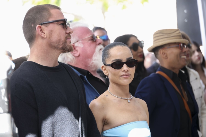 Channing Tatum and Zoë Kravitz were seen smiling and holding hands as they stepped out in New York City on Sunday, July 14. See their coordinating oversized his-and-hers looks here.