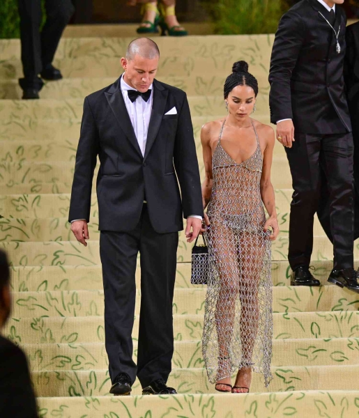 Channing Tatum and Zoë Kravitz were seen smiling and holding hands as they stepped out in New York City on Sunday, July 14. See their coordinating oversized his-and-hers looks here.