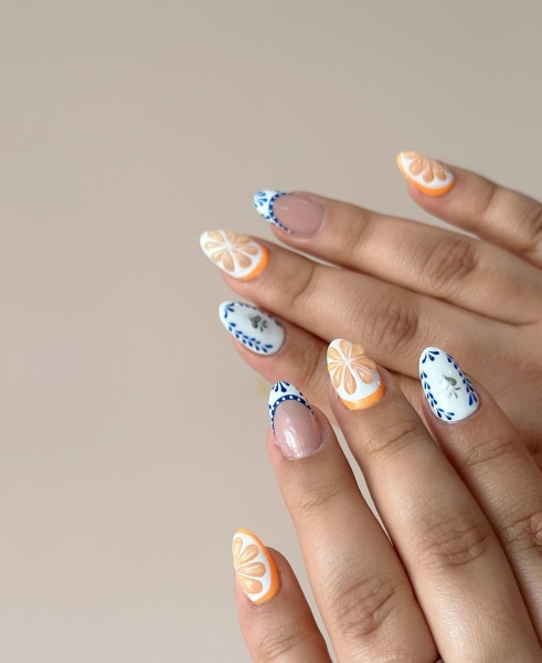 Citrus nails are everywhere right now. Limes, lemons, oranges, and grapefruit make for nail art that's fun, (often) intricate, and perfect for summer. Here are 14 gorgeous options.