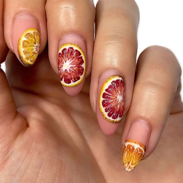 Citrus nails are everywhere right now. Limes, lemons, oranges, and grapefruit make for nail art that's fun, (often) intricate, and perfect for summer. Here are 14 gorgeous options.