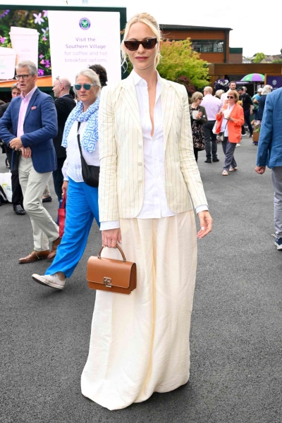 From preppy stripes and Gucci blazers to patterned crop tops and pinstripes, these spectators are perfectly comfortable stepping into the spotlight at Centre Court.