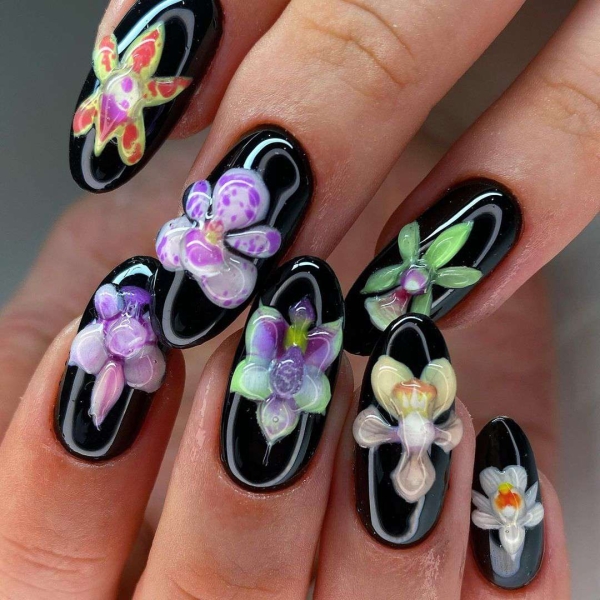 From raised petals to metallic decals, there are lots of ways to achieve 3D flower nail designs. Scroll through 16 jaw-dropping designs to inspire your next manicure.