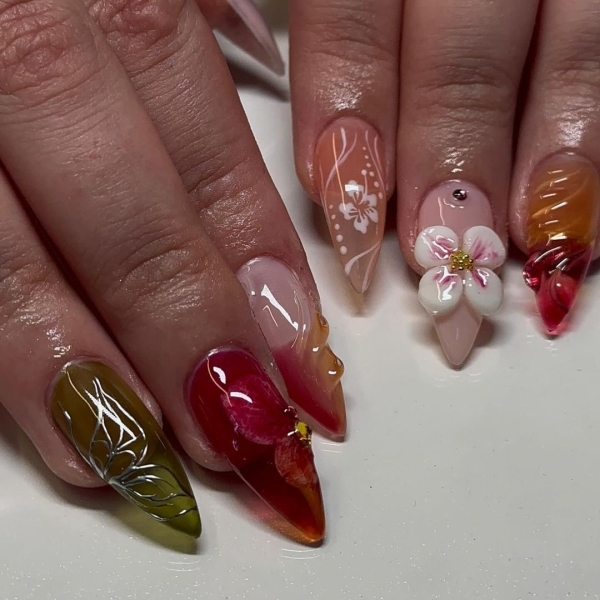 From raised petals to metallic decals, there are lots of ways to achieve 3D flower nail designs. Scroll through 16 jaw-dropping designs to inspire your next manicure.