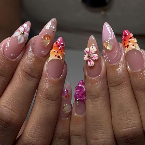 From raised petals to metallic decals, there are lots of ways to achieve 3D flower nail designs. Scroll through 16 jaw-dropping designs to inspire your next manicure.