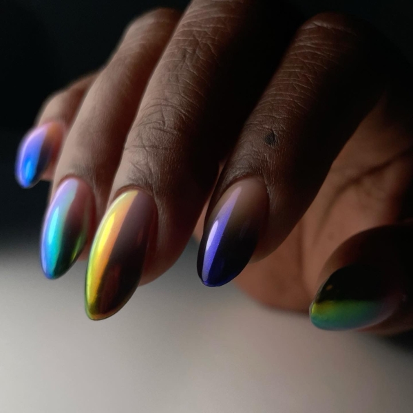 Hailey Bieber's chrome nails seem to never go out of style. Celebrity nail artists Sashanie Gray and Rachel Messick share everything you need to know about chrome nails and 15 of their favorite designs.