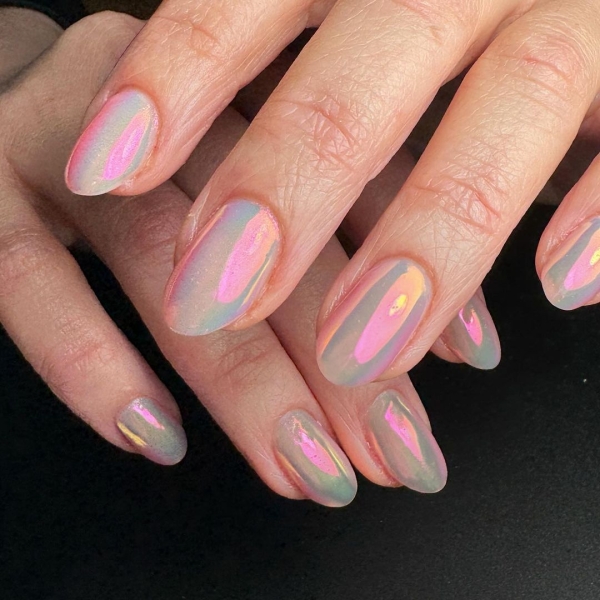 Hailey Bieber's chrome nails seem to never go out of style. Celebrity nail artists Sashanie Gray and Rachel Messick share everything you need to know about chrome nails and 15 of their favorite designs.