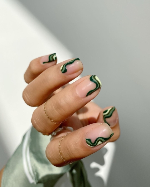 It's undeniable: Green is the color of the moment. Whether you want to go full neon or more muted, here are 18 short green nail looks to inspire your next manicure.