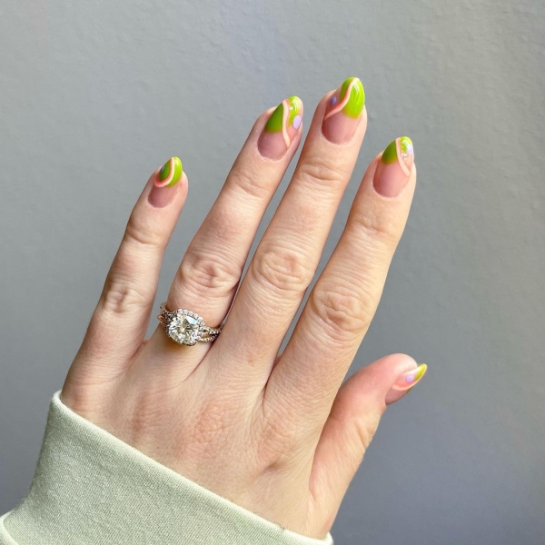 It's undeniable: Green is the color of the moment. Whether you want to go full neon or more muted, here are 18 short green nail looks to inspire your next manicure.