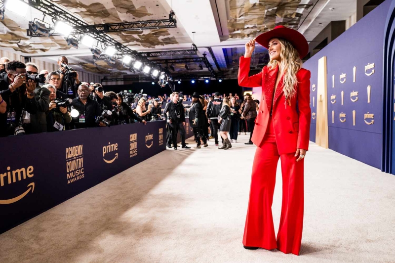 Lainey Wilson gave InStyle an exclusive look behind the scenes as she got ready for the 2024 ACM Awards, where she took home three awards. See her glam process, details on her chic Area suit, the story behind her Kendra Scott jewelry, and more.