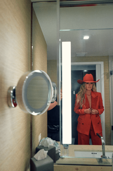 Lainey Wilson gave InStyle an exclusive look behind the scenes as she got ready for the 2024 ACM Awards, where she took home three awards. See her glam process, details on her chic Area suit, the story behind her Kendra Scott jewelry, and more.