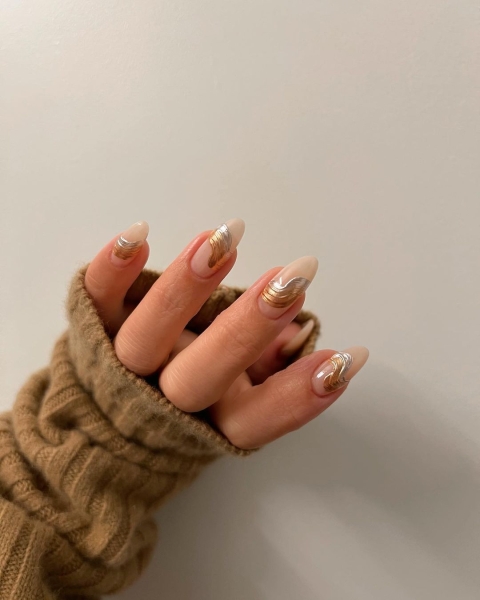 Metallic nails offer an easy way to create a bold look that functions like jewelry — you can wear them seamlessly with any outfit.