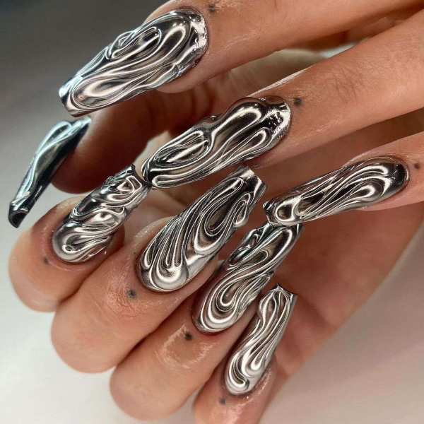 Metallic nails offer an easy way to create a bold look that functions like jewelry — you can wear them seamlessly with any outfit.