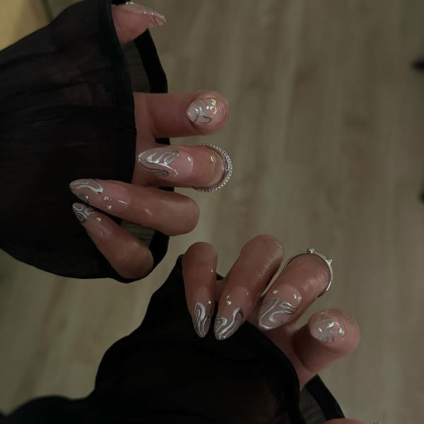 Metallic nails offer an easy way to create a bold look that functions like jewelry — you can wear them seamlessly with any outfit.