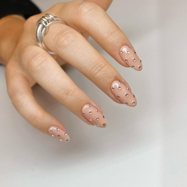 Metallic nails offer an easy way to create a bold look that functions like jewelry — you can wear them seamlessly with any outfit.